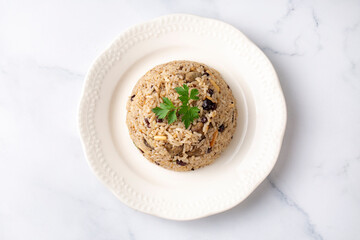 Traditional delicious Turkish food; rice pilaf with pine nuts and currants (Turkish name; ic pilav or pilaf)