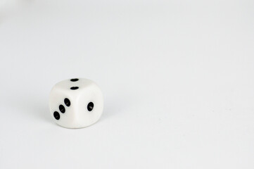 white dice on a white background