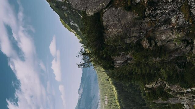 Tatra National Park, Poland. Hyperlapse. Famous Mountains Lake Morskie Oko Or Sea Eye Lake In Summer Day. Tatras Lake Landscape. UNESCO's World Network of Reserves. Polish Nature. Vertical Footage.
