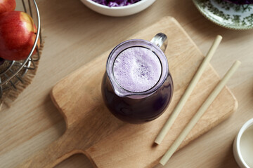 Cabbage juice with bamboo straws. Zero-waste
