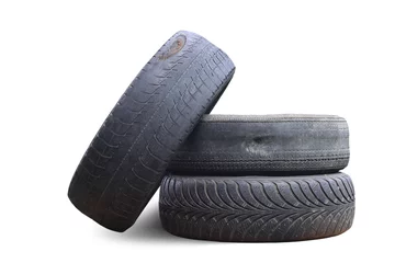 Foto op Plexiglas Schip old worn damaged tires isolated on white background