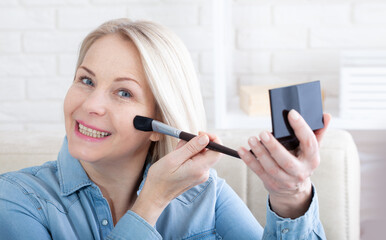 Mirror Magic enchanting image showcasing a woman engrossed in her makeup routine, with the mirror...
