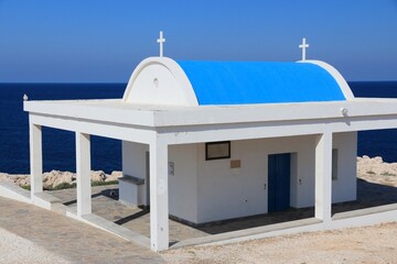 Cyprus blue white church. Cyprus - Mediterranean Sea coast. Agioi Anargyroi church at Cape Greco.