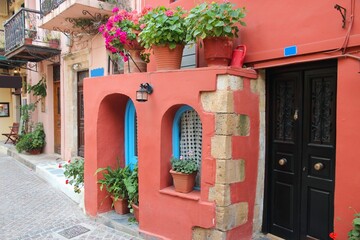 Chania, town on Crete island in Greece. Old town architecture with flowers.