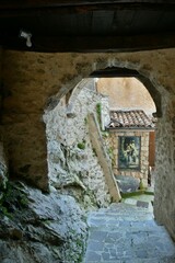 Fototapeta na wymiar A characteristic street in Cervara di Roma, a medieval village in Lazio, Italy.