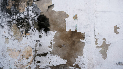 Old cement wall peel exterior texture background with white Paint peeling low quality, Cracked Wall
