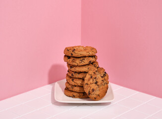 Delicious cookies with chocolate chunks on a white plate. Organic healthy product.