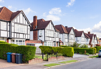 Suburban street with Tudor-style houses, Harrow, London, UK