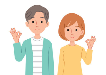 笑顔でOKサインをする男女
Men and women who make an OK sign with a smile