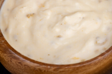 fresh yogurt made from milk with pieces of dried apricots