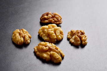 Closeup of walnuts on black background