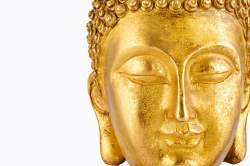 Closeup of gold buddha statue isolated on white background with clipping path