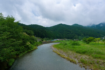 Fototapeta na wymiar 和歌山県田辺市 中辺路町近露 雨の日置川