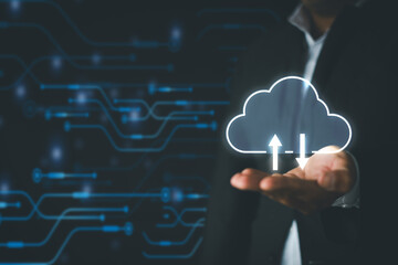 Cloud Computing,Data storage concept.,Businessman holding cloud storage icon over technology background perfect for business network,IOT idea.
