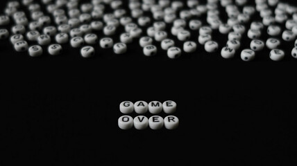Words GAME OVER made with round blocks