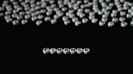 Word FINANCE made with round blocks