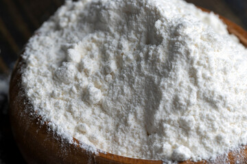 Wheat flour from a wooden bowl
