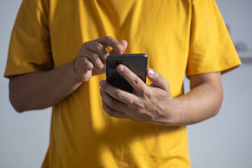 male hand using mobile phone technology communication internet