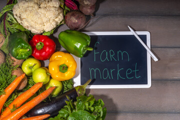 Farm organic market shopping concept, Wooden box with summer, autumn raw vegetables and fruits 