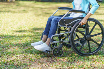 Obraz premium Depressed sad asian woman in wheelchair&nbsp;lonely disabled adult