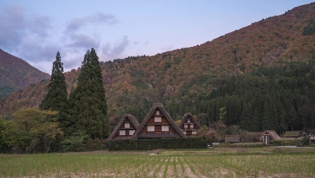 Shirakawago village Gifu Japan time lapse 4K, Historical Japanese traditional Gassho house at Shirakawa village day to night autumn foliage timelapse