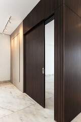 Perfective wooden wall texture with opened door
