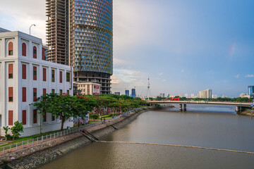 Fototapeta premium Evening at District 4, see the Bitexco Tower and IFC One Tower, two of the beautiful office building in Ho Chi Minh city