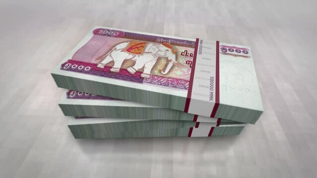 Myanmar money Burma Kyat money pile pack. Concept background of economy, banking, business, crisis, recession, debt and finance. 5000 MMK banknotes stacks 3d animation.