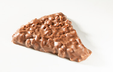 Chocolate chip cookies with nuts on a white background close-up