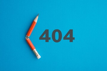 Red broken pencil with 404 error code on blue background. Concept of online internet web. 404 sorry, page not found is HTTP status code error that indicates server could not find what was requested.