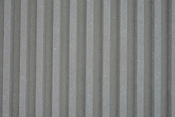 Naklejka premium Mur de béton à rayures en relief