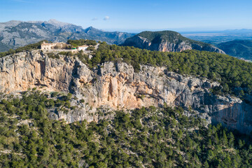 Castle of Alaró (Mallorca). Ruins of a medieval castle on the summit of a mountain in the Serra de Tramuntana on the island of Mallorca, where there is now a mountain refuge. Balearic Islands, Spain.