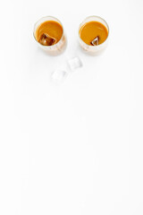 Two glasses of cold latte coffee with ice. Summer coffee drink