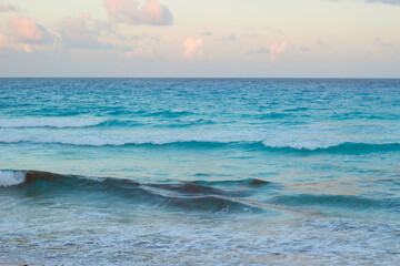 Waves in the sunset beach