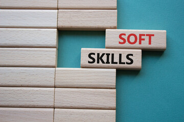 Soft skills symbol. Wooden blocks with words Soft skills. Beautiful grey green background. Business and Soft skills concept. Copy space.