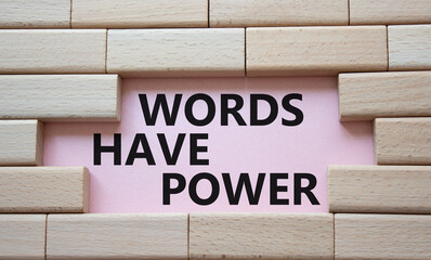 Words have power symbol. Wooden blocks with words Words have power. Beautiful pink background. Business and Words have power concept. Copy space.