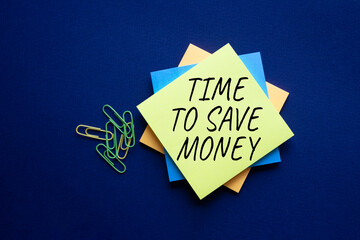 Time to save money symbol. Yellow steaky note with words Time to save money. Beautiful deep blue...