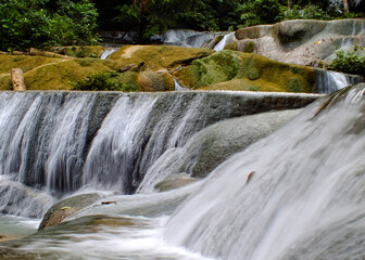 The scenery of Moramo Waterfall, Southeast Sulawesi, one of the terraced waterfalls in Indonesia.