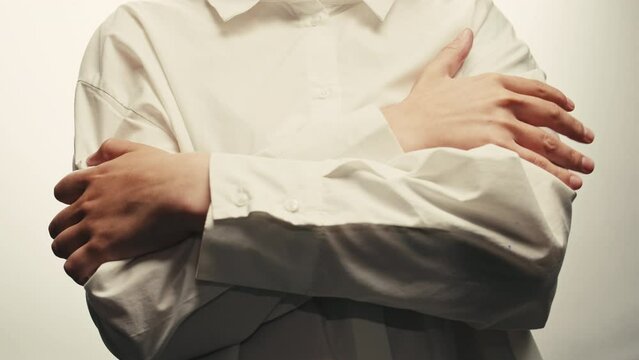 Hand tremor. Parkinson patient of psychiatric clinic. Man with mental disorders. Shaking hands close up, macro. Mentally ill patient picks and scratches his hands. 