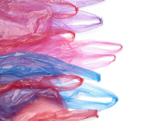 Many different plastic bags on white background