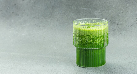 Freshly blended green smoothie in the jar. Detox and clean diet concept. place for text, top view