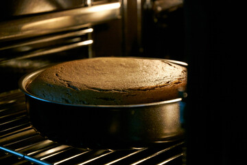 The cake is cooked in the oven