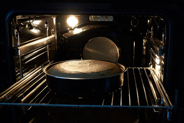 The cake is cooked in the oven