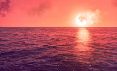 Fototapeta na wymiar Sunset seascape with sun reflection