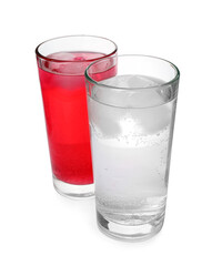 Glasses of different refreshing soda water with ice cubes on white background