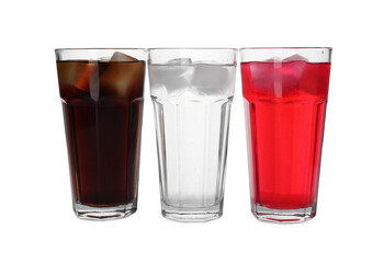 Glasses of different refreshing soda water with ice cubes isolated on white