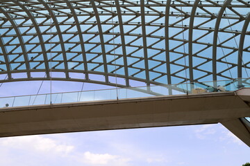 Fototapeta premium Straight and curved lines in construction and architecture. Abstract geometric background.