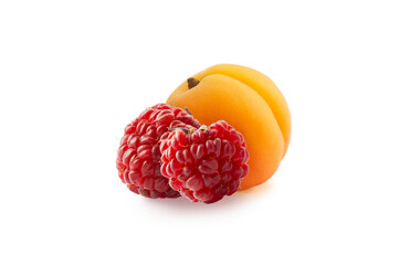 Apricot and raspberry on white. Sweet apricot with raspberries isolated on white background cutout.