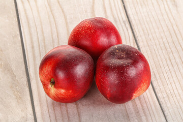Ripe sweet juicy nectarines heap