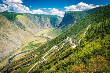 View of the Katu Yaryk pass in Altai Republic, Russia. Altai mountains. Mountain pass Katu-Yaryk. Valley of the mountain river Chulyshman. Mountain dangerous road